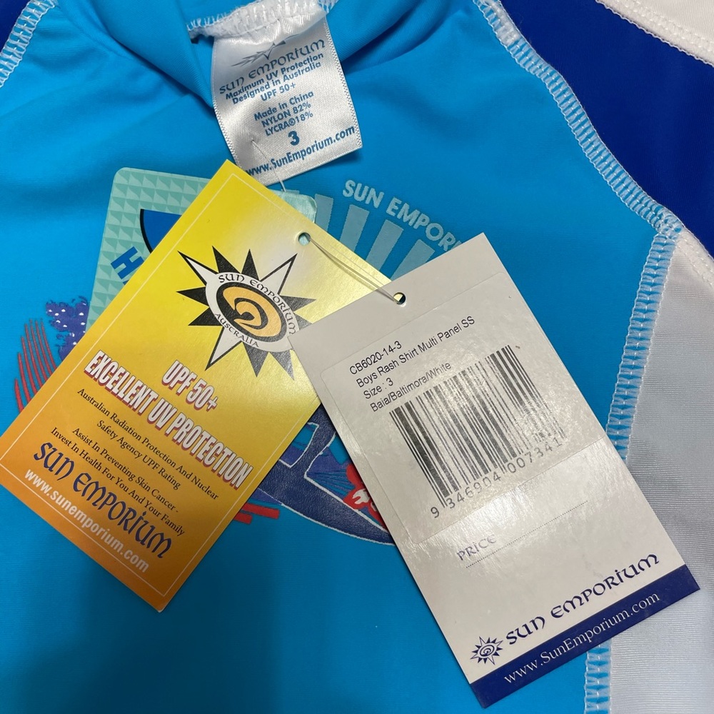 Brand new Sun Emporium rash guard